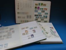 Three albums of Isle of Man and Channel Island stamps
