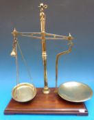 A set of W & T Avery Ltd 8oz banking beam scales