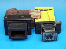 An Ernemann vest pocket folding plate camera together with a model 22 Ensign Midget and related