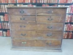 A large 19thC pine chest of four over three graduated drawers (H112 x W42 x D52cm)