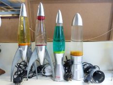A collection of three Mathmos lava lamps and one other,