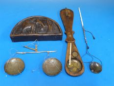 An Indian travelling beam scale in carved semi-circular box together with an eastern opium scale in