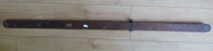 An unusual folding plumb bob type level with ministry mark and marked MDS Ltd