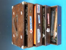 An engineer's chest of tools including micrometers,