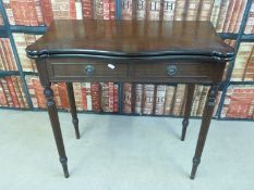 A swivel top and fold over games table (W78cm x H77cm x D40cm)