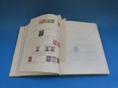 A Stanley Gibbons colonial King George VI album of used stamps including some high values