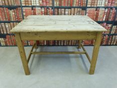 A rustic pine kitchen table (L124 x W95 x H80cm)