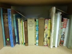 A selection of children's books including B.