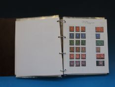 An album of GB stamps Victoria QE II