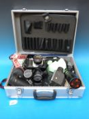 An Asahi Pentax SLR camera and assorted lenses in hard protective case,