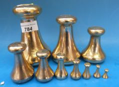 A run of Avery bottle shaped weights, 7lb down to 1/4 oz,