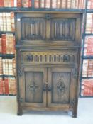 An oak old charm style cocktail cabinet