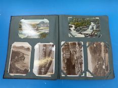 An album of mainly photographic postcards including Isle of Wight (six in total) and other UK