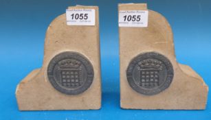 Two stone bookends made from stone reclaimed from the House's of Parliament after bombing during