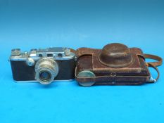 A 1935 Leica III camera , serial number 162974 fitted with an Elmor 1:3.