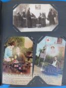 A vintage postcard album containing approximately 67 Edwardian and WWI romantic, subjects,