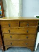 An ash and oak chest of two over three graduated drawers (W99 x D43cm x H103cm)