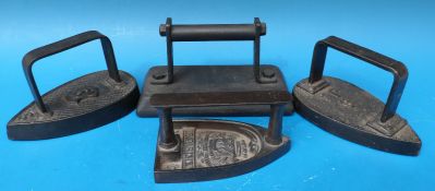 A Le Parisien No 4 flat iron together with two pear shaped flat irons and a billiard table iron