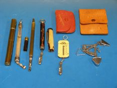 Five various letter scales including one formed as a pen,
