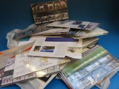 A large quantity of GB presentation packs and stamp booklets