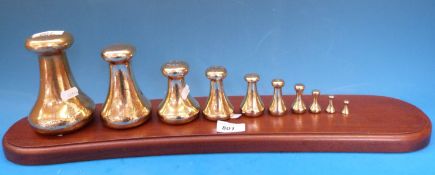 A run of ten bell weights, 7lb down to 1/4oz,