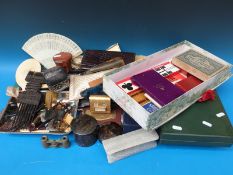 Box of accessories including Dunhill lighters, cutlery,