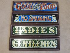 Four mirrored signs; 'Ladies', 'Gentlemen',