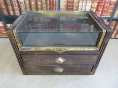 A haberdashery shop counter top display cabinet with lift up glazed top and two doors below (W67cm