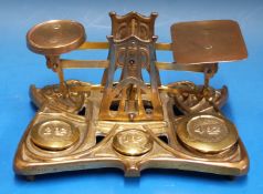 A set of possibly Setton & Durward brass Art Nouveau / Arts and Crafts postage scales the brass