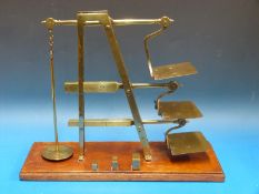 A three tier GPO ladder postage scale by Degrave & Co London,