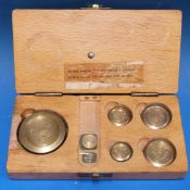 A cased set of SC85A GP0 test weights, 4oz downwards,