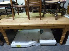 A pine farmhouse kitchen table (L181 x W89 x H78cm)