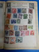 Nine miscellaneous albums including a Strand album of all world stamps and items