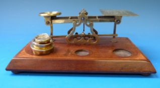 A set of brass postage scales,