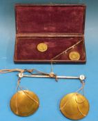 A leather-cased W & T Avery hand-held beam scale with steel beam,