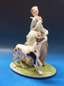 An Australian Keramos figurine of a lady with Great Dane