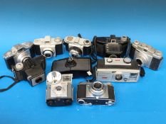 A collection of vintage cameras to include Kodak, Retinette,