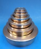 A run of Avery flat stacking weights,
