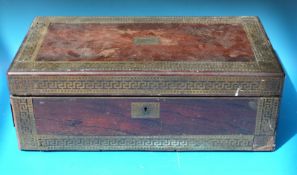A 19thC rosewood writing slope with Greek key decoration in brass,
