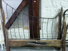 A rustic oak and metal bed frame