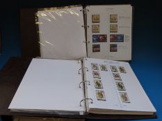 Three albums of GB QE II stamps