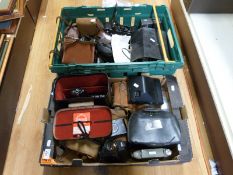 A collection of cameras to include vintage folding Kodak, box cameras,