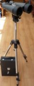 A cased set of Opticron 20 x 80 binoculars on tripod