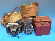 A Rolleiflex TLR camera, red box camera,
