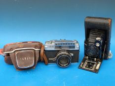 An Ensign folding camera with Trichro shutter together with a Taron Eyemax camera