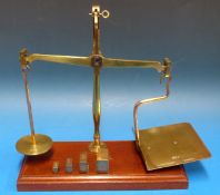 A set of De Grave & Co GP0 postage scales stamped GP0 to both pans, with 0.