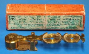 A Harrison sovereign rocker in card box