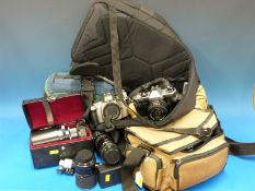 Three SLR cameras comprising Praktica LTL3 Praktica LB together with a Nikon FSS body, Tamron 50mm,