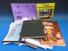 A quantity of books and catalogues etc relating to scale collecting