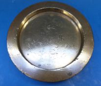 A 7lb brass flat stacking weight